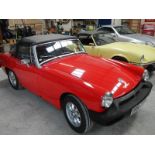 A 1976 MG Midget 1500, MOT exempt, last MOT expired 14/04/2019.