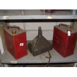 2 plain 2 gallon petrol cans and a funnel.