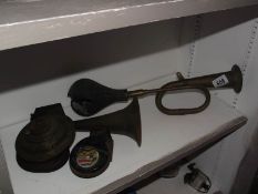 A vintage jubilee No.68 piggy back diesel diesel trumpet car horn and a brass car horn.