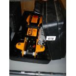 A boxed Halfords 2 ton trolley jack.
