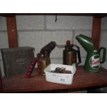 An original Castrol oil jug, a brass blowgun, garden sprayer etc.