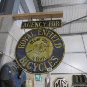 A Royal Enfield bicycles hanging enamel double sided sign.