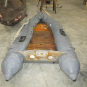 An inflatable rowing boat.