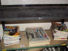 A collection of car fixit magazines and old car/bike related newspapers.