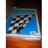 A large hardback book 'Grand Prix, The Cars, The Drivers, The Circuits' by Michael Joseph.