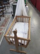 A swing cot / cradle