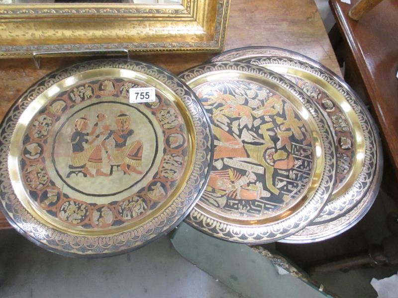 4 Egyptian metal plaques and 1 Islamic metal plaque and stands