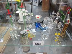 A collection of small glass animals,