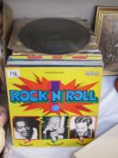 A collection of LP records including rock and roll