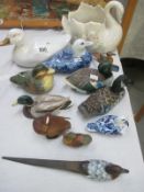 A quantity of pottery and china ducks etc