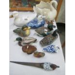 A quantity of pottery and china ducks etc