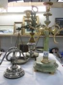 Two candelabras and a weighing scales