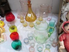 A collection of coloured and retro glassware