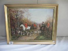 A framed varnished/overpainted hunting print