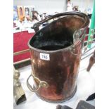 A large copper coal scuttle