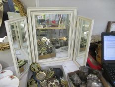 A triptych dressing table mirror