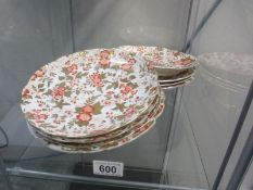 A quantity of plates and matching cake stands bearing mark C T