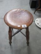 A vintage wooden stool