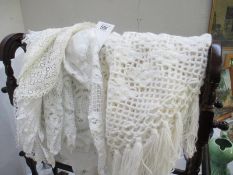 A quantity of lace items and crochet items