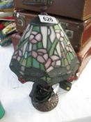 A small Tiffany style lamp