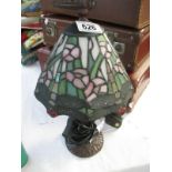 A small Tiffany style lamp