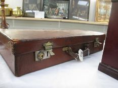 A vintage brown leather attache case