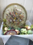 A large round glass framed flower arrangement montage and box flower arrangement items