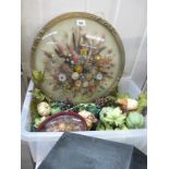 A large round glass framed flower arrangement montage and box flower arrangement items