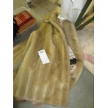 A light fur coat