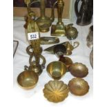 A collection of brassware items including Cobra