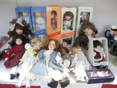 A large collection of dolls some boxed