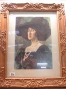 An ornate framed print of a lady