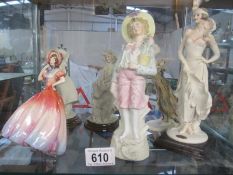 A collection of 6 lady figurines