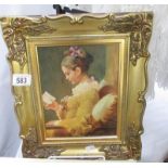 A retro gilt framed picture of a lady reading