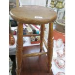 A vintage wooden stool