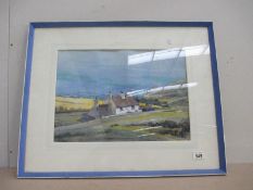 A framed and glazed watercolour of a House by the Sea signed Beresford Johnson