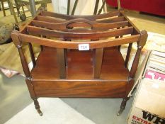 A antique style Canterbury magazine rack