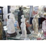 4 lady figurines including Classical styles