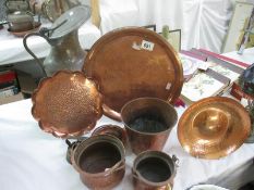 A collection of copper bowls,