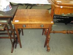 A small table with drawer