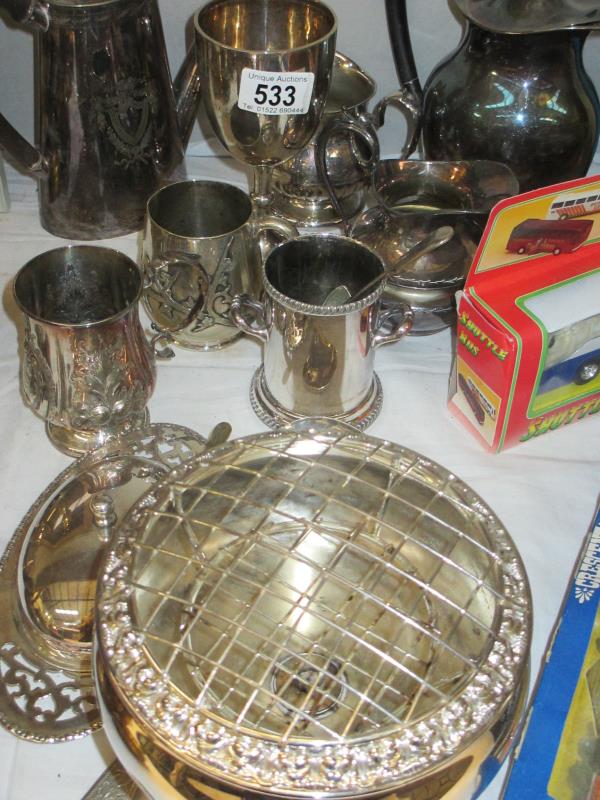 A collection of silverplate items