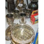 A collection of silverplate items