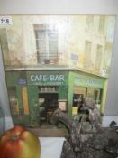 A canvas print of a French café bar