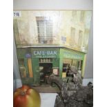 A canvas print of a French café bar