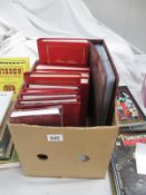 A box of albums and photographs etc