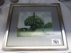 A small framed and glazed watercolour of a Pastotal scene