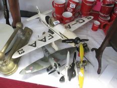 A collection of model aeroplanes and parts