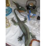 A plastic iguana and a plastic whale