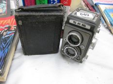A quantity of old cameras