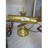 A brass desk lamp